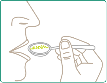 illustration showing a patient about to swallow capsule contents from a spoon
